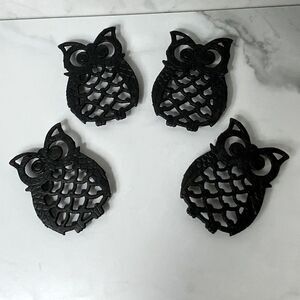 Set of 4 cast iron owl trivets